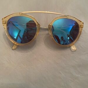 Westward Leaning Blue Mirrored Lensed Sunglasses with Gold Frame